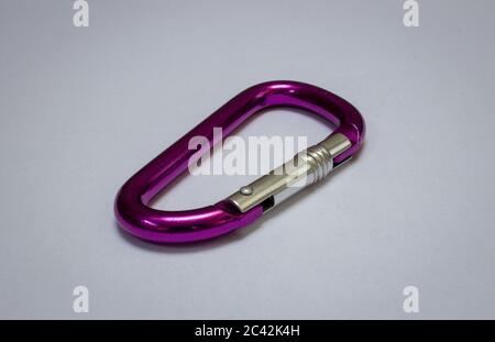 Small purple carabiner used for light loads Stock Photo