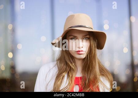 Portrait of young woman wearing hat Stock Photo