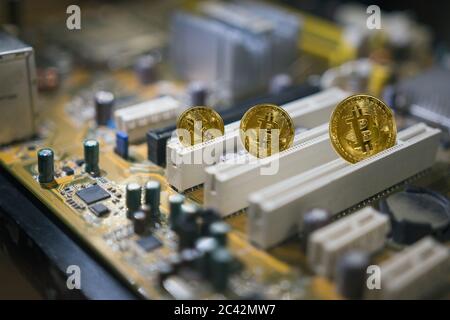 Bitcoin mining inside a computer Stock Photo