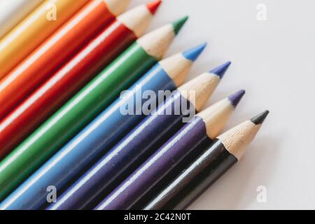 Multi-colored coloring pencils on white background Stock Photo