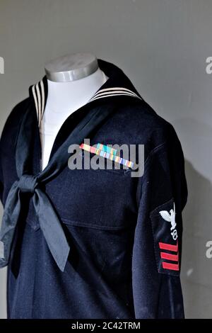 A World War II era sailor's blue dress uniform with insignia and campaign  ribbons on display at the Ft. Miles Museum, Cape Henlopen, DE Stock Photo -  Alamy