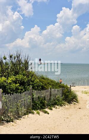 Delaware Breakwater Lighthouse as seen from the dunes of Cape Henlopen State Park. Stock Photo