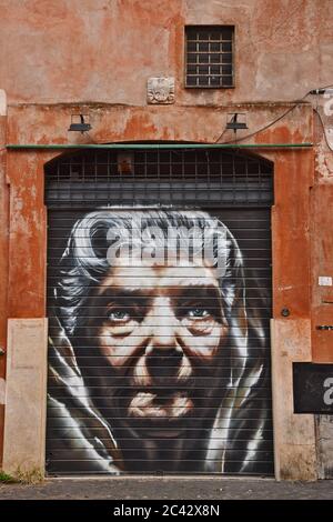 Graffiti painted on a wall in a neighborhood of Rome Stock Photo