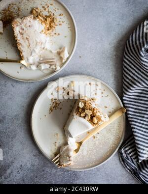 Vanilla streusel  ice cream cake on a plate. Stock Photo