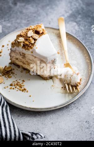 Vanilla streusel ice cream cake on a plate. Stock Photo