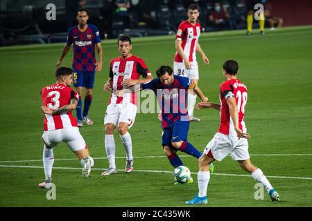 Barcelona, Spain. 23rd June, 2020. Barcelona's Lionel Messi (2nd R, front) controls the ball during a Spanish league football match between Barcelona and Athletic Bilbao in Barcelona, Spain, June 23, 2020. Credit: Joan Gosa/Xinhua/Alamy Live News Stock Photo