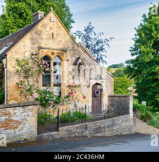 The old school house in the early morning. Upper Slaughter , Cotswolds, Gloucestershire, England Stock Photo