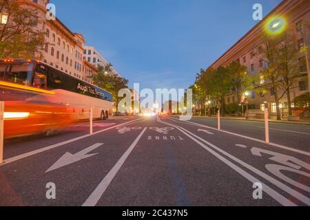 WAshington DC  USA - October 25 2014; Capitol building at end of Pennsylvania Avenue at night with blurs of passing vehicles lights. Stock Photo