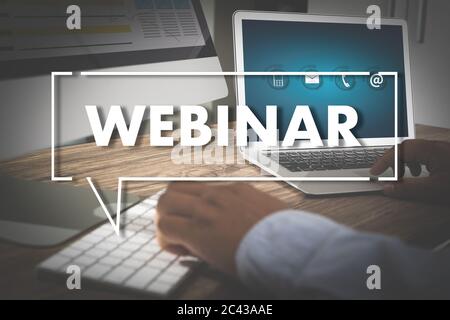 WEBINAR hand on table use E-business Browsing Connection in computer, coffee break in classroom to use cloud communication Stock Photo