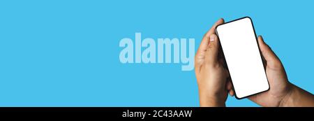 man using  Mock up a Cell Phone With Blank Screen space banner Stock Photo