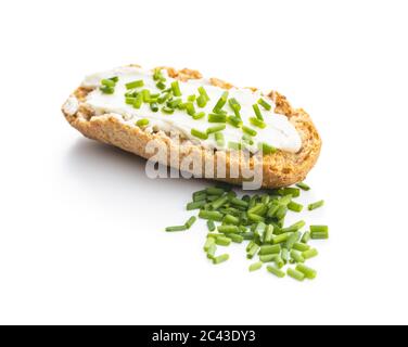Crispbread with creamy cheese and green chive. isolated on white background. Stock Photo