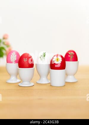 Easter eggs in egg cups, Munich, Bavaria, Germany Stock Photo