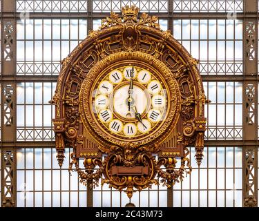 Large gold clock in the Musee d'Orsay, Paris, France Stock Photo