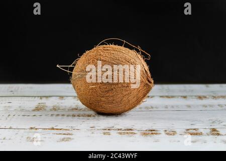 Cocunut shell on white table and back background Stock Photo