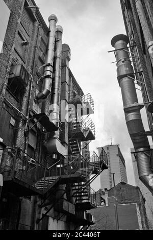 Fire escape in a back lane (St. James Street) in Chinatown, Manchester, England, UK Stock Photo