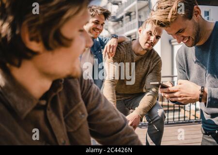 Young business people meeting on a roof terrace Stock Photo