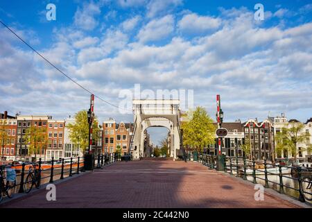 Netherlands, North Holland, Amsterdam, Clouds over Skinny Bridge Stock Photo