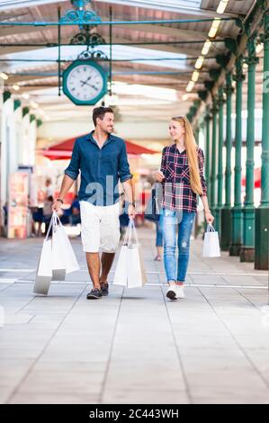Young couple on a shopping spree Stock Photo