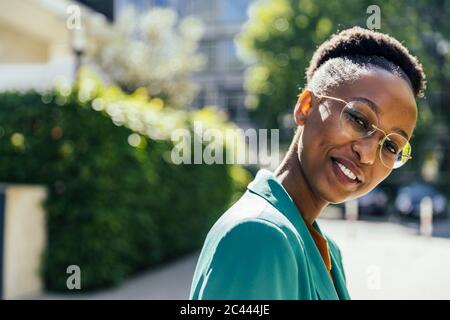 Portrait of young businesswoman wearing glasses Stock Photo