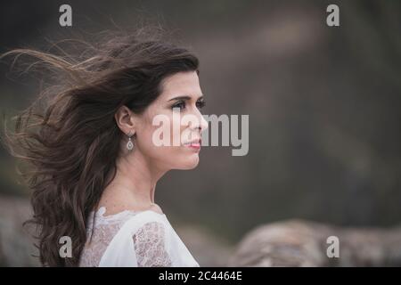 Portrait of bride looking sideways Stock Photo