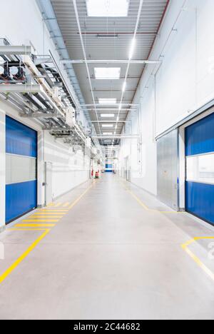 Long corridor in empty factory Stock Photo