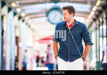 Portrait of young man with headphones Stock Photo