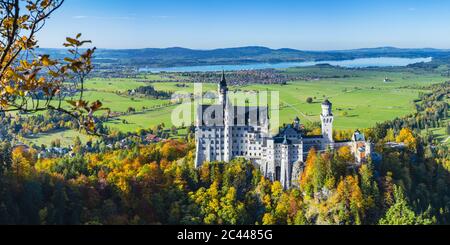 Germany, Bavaria, Hohenschwangau, Panorama of Neuschwanstein Castle in autumn Stock Photo