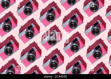 Seamless pattern of rows of vintage analog cameras Stock Photo