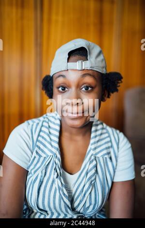 Portrait of a teenage girl wearing a baseball cap Stock Photo