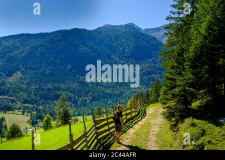 Austria, Tyrol, Steinberg am Rofan, Male backpacker hiking along Panorama Way Stock Photo