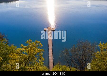 Germany, Bavaria, Inning am Ammersee, Drone view of jetty on shore of Lake Worth Stock Photo