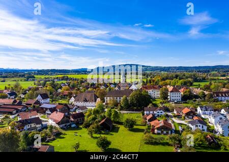 Germany, Bavaria, Polling, Helicopter view of countryside village in spring Stock Photo