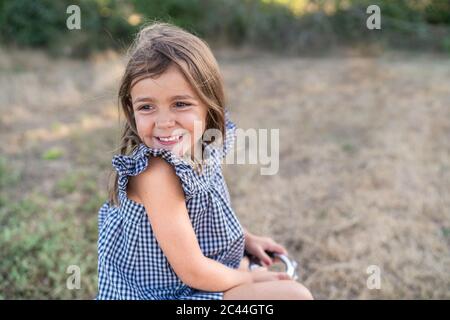 little positive girl with long brown hair rejoicing at her cookies in the  kichen, mother is praising her, good job, well done Stock Photo - Alamy