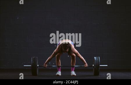 nude woman squat down Stock Photo - Alamy