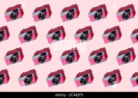 Seamless pattern of rows of vintage analog cameras Stock Photo