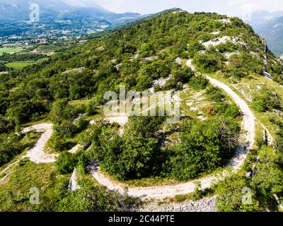 Italy, Veneto, Verona, Aerial view of winding dirt road Stock Photo