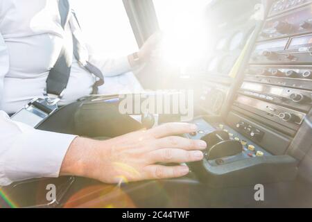 Pilot flying in sports plane, using control wheel Stock Photo