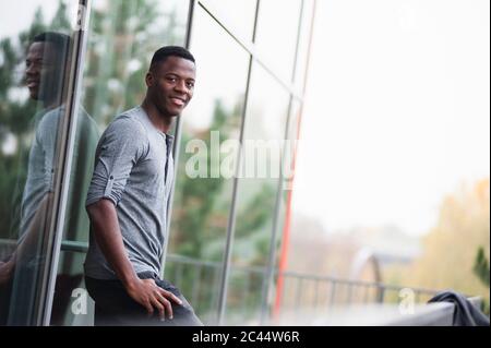 Smiling man looking at camera Stock Photo