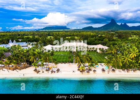 Mauritius, Black River, Flic-en-Flac, Helicopter view of oceanside village beach and luxurious hotel in summer Stock Photo