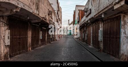 Historic City of Jeddah,old Houses , in a cloudy sky Saudi Heritage.Jeddah, Saudi ArabiAn old alley Stock Photo