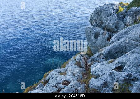 Blue sea from cliff viewpoint in Himara Stock Photo