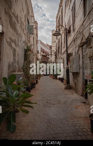 An old alley between old houses, Corridors or roads between homes in the old city of Jeddah Stock Photo