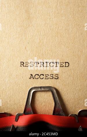 Restricted access text written on a paper. Stock Photo
