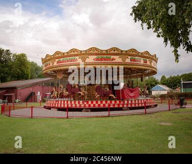 Silent carousel at  Bressingham Gardens re-opened with Covid-19 lockdown restrictions. Bressingham, Diss, Norfolk, UK - June 19th 2020 Stock Photo