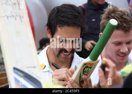 Mitchell Johnson (with his moustache) and James Faulkner signed autographs for Australian fans in front of the Sydney Opera House as they celebrated t Stock Photo