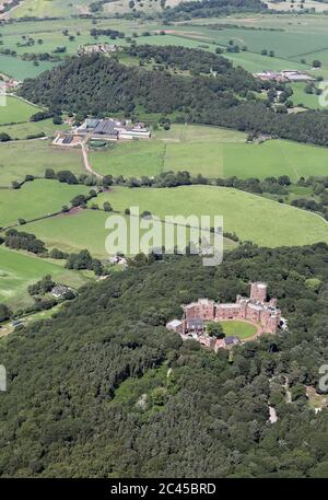 aerial view of Peckforton Castle in Cheshire with Beeston Castle in the background, UK Stock Photo