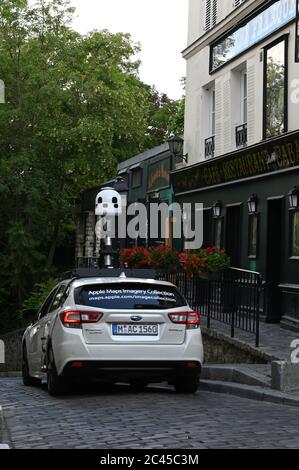 Paris, Montmartre, June 20 3030 : Apple Maps car mapping roads, gathering data to use it in its own application creating 3-D map. Stock Photo