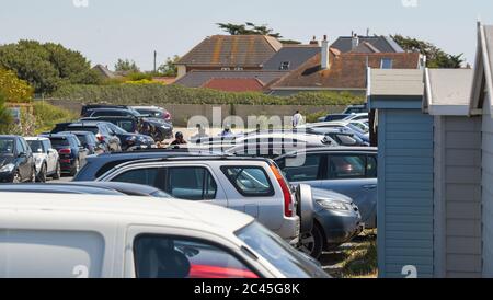 Worthing UK 24th June 2020 - The car parks are full as crowds hit  the beaches at Ferring near Worthing in West Sussex today as they enjoy the heatwave weather  with temperatures reaching 30 degrees in some parts of the South East   : Credit Simon Dack / Alamy Live News Stock Photo