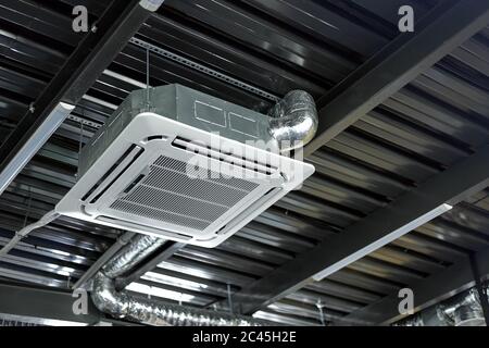 Air conditioning technology square conditioner ceiling building. Industrial background Stock Photo