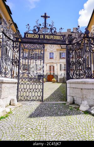 Hotel-Dieu (old Pruntruter hospital) build 1761, now a museum and library, Porrentruy, canton Jura, Switzerland. The Latin inscription 'Christo in pau Stock Photo